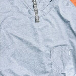 Vuori Tradewind Performance Tee  Pacific Heather Blue Short Sleeve Tee